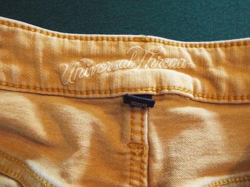 Universal Thread Shorts Size 0. Yellow. May run a bit small due to washings.